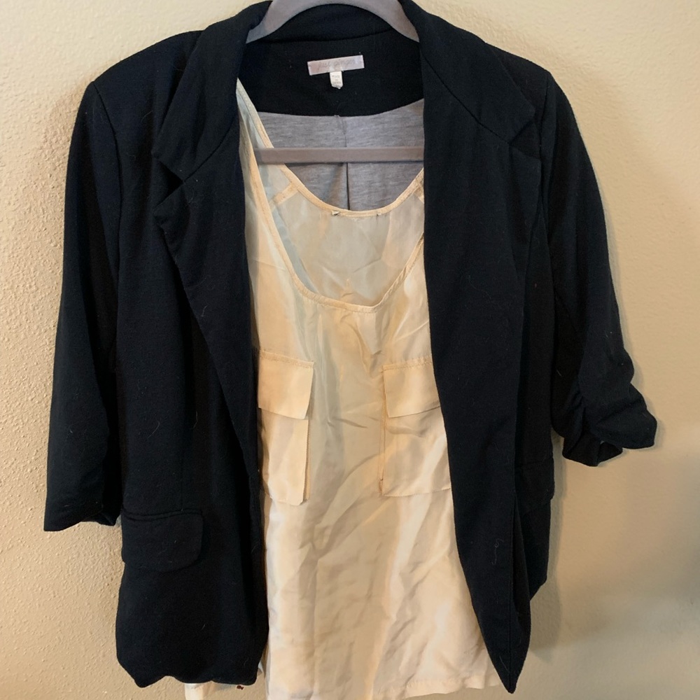 Women’s 3/4 sleeve blazer in black. Professional.